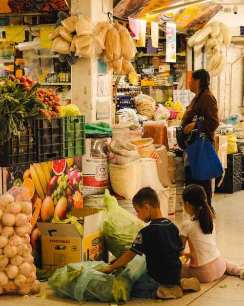 Free Colorful market in Aguascalientes with fresh produce and people shopping, showcasing traditional Mexican culture. Stock Photo