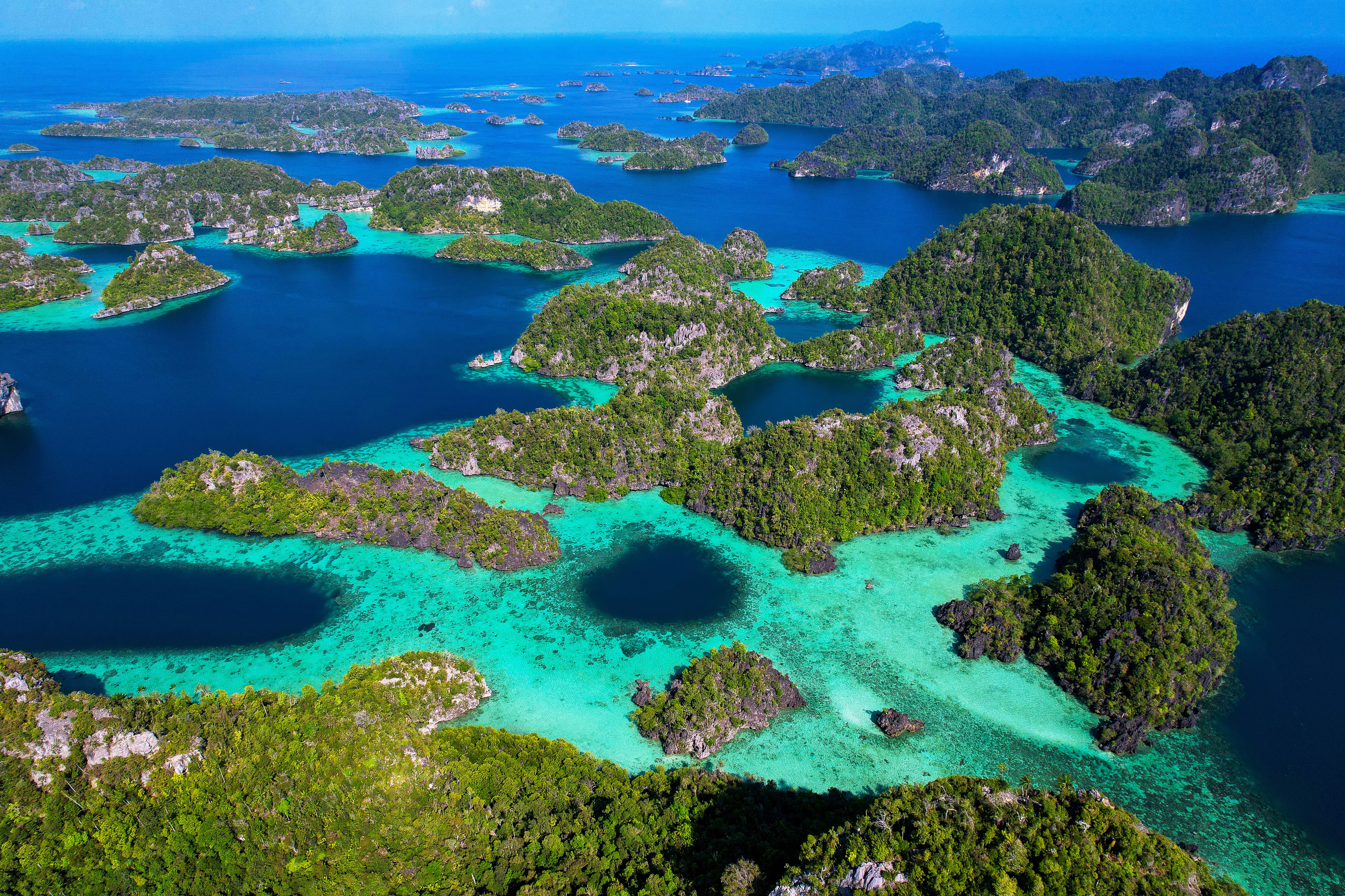 Aerial view of Raja Ampat islands and turquoise lagoon