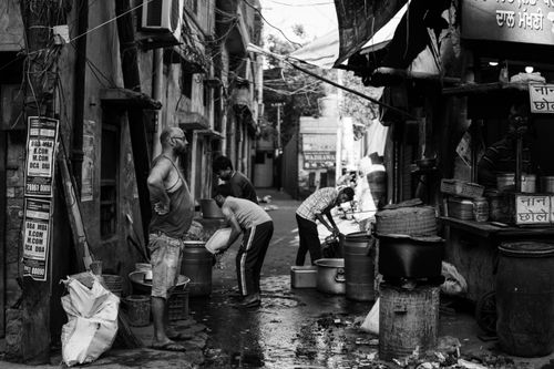 Free A candid black and white street scene capturing daily life in Ludhiana, Punjab, India. Stock Photo
