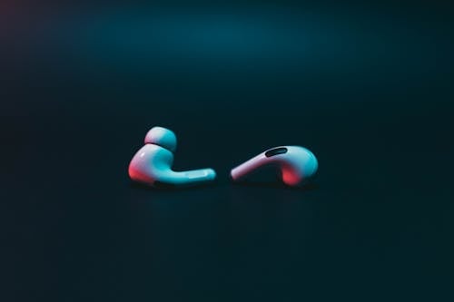 Free Pink and White Plastic Earphones Stock Photo