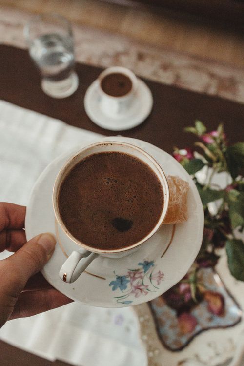 Free Enjoy a traditional Turkish coffee with a piece of Turkish delight. Perfect for morning routines. Stock Photo
