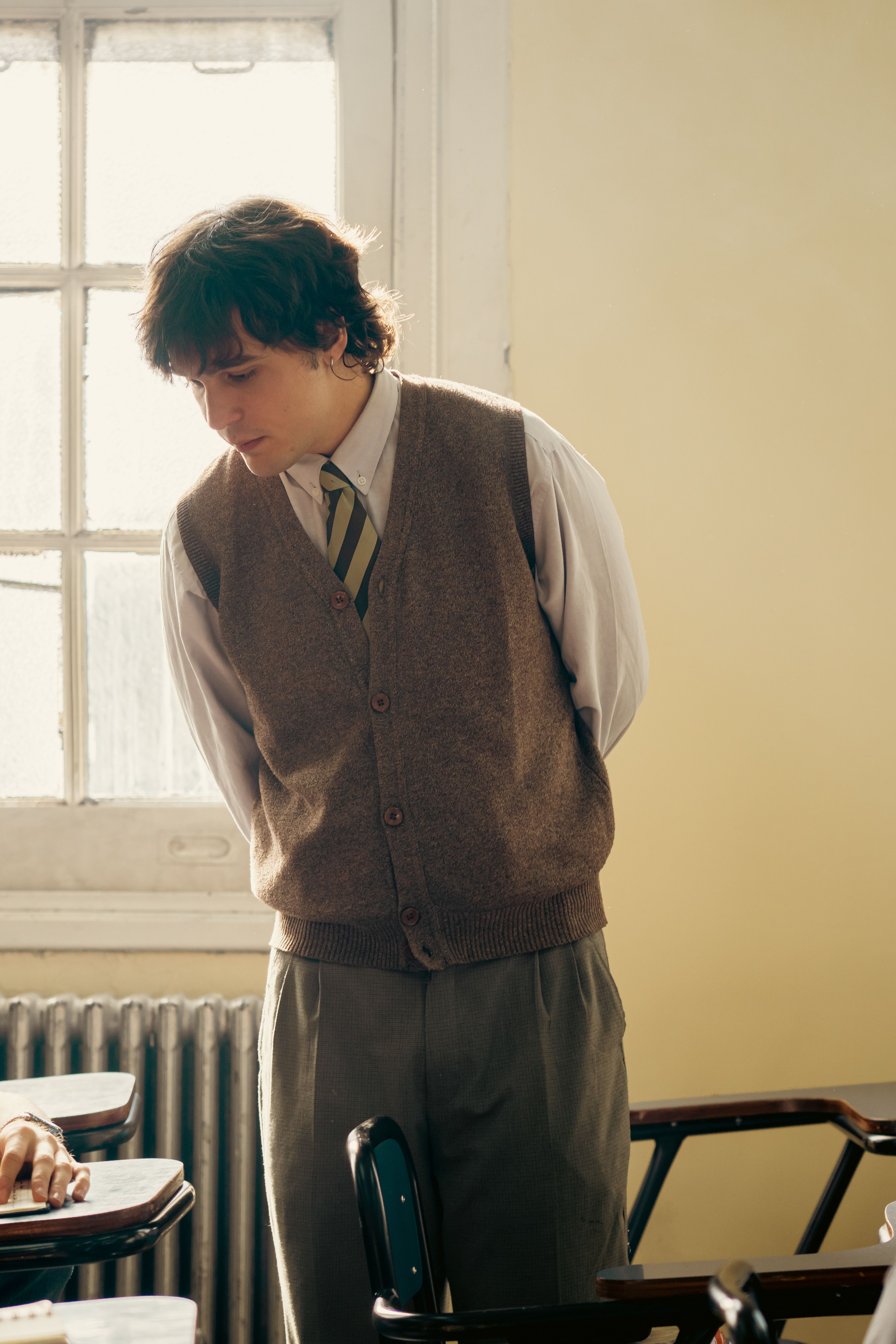 Young Man in Vintage Classroom Setting · Free Stock Photo