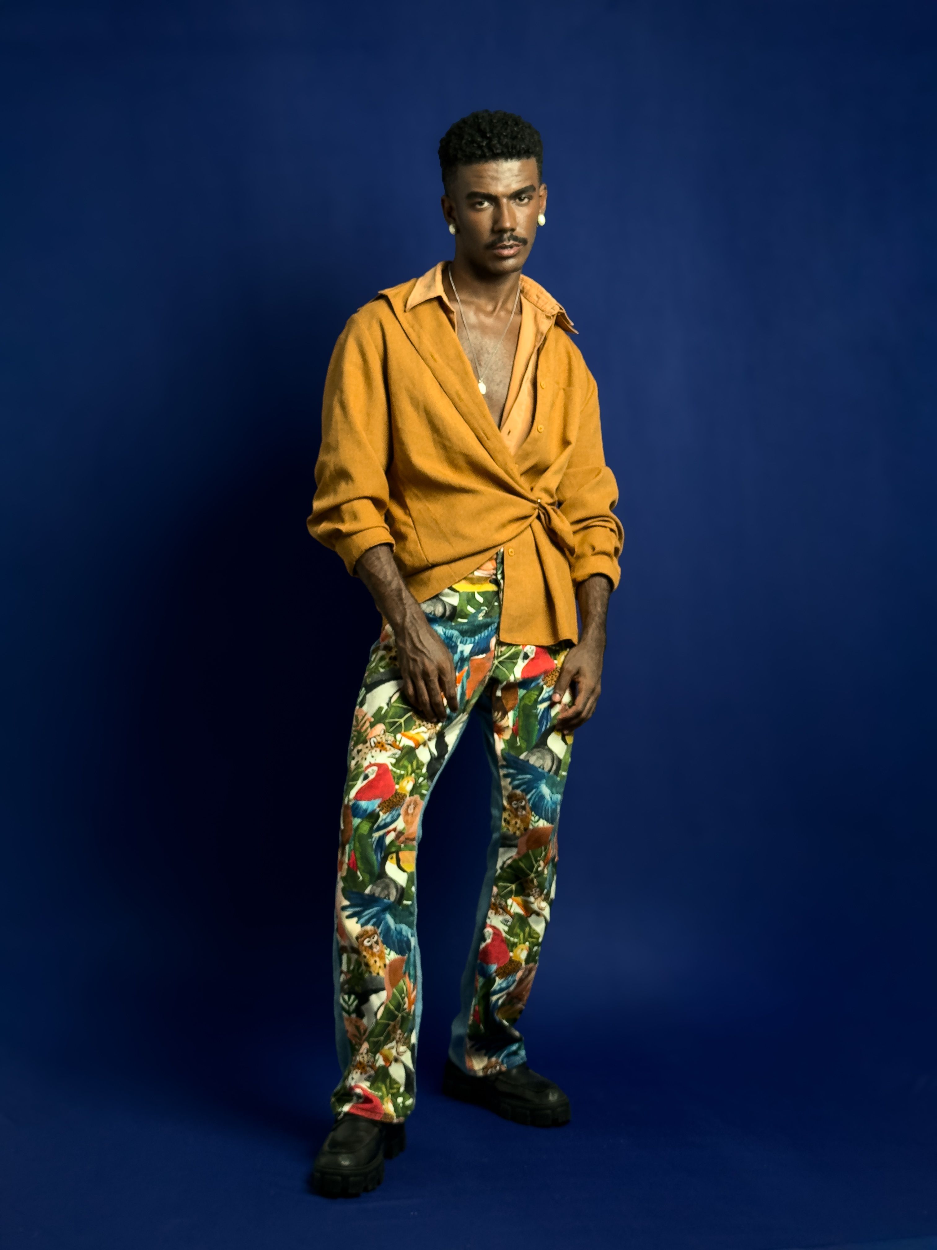 Stylish Portrait of a Man in Vibrant Fashion · Free Stock Photo