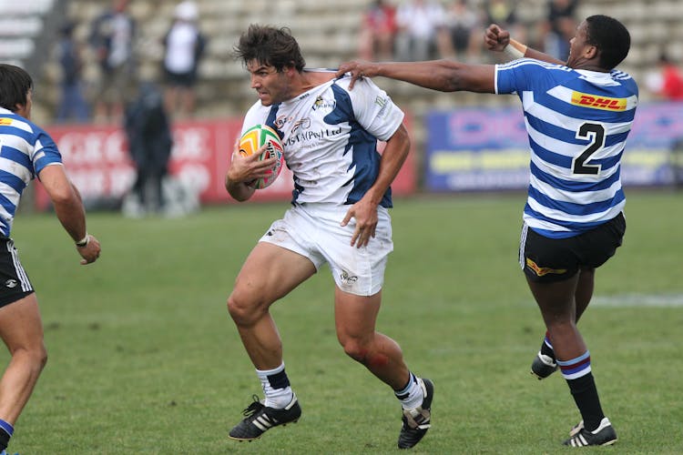 Photo Of A Men Holding A Rugby Ball