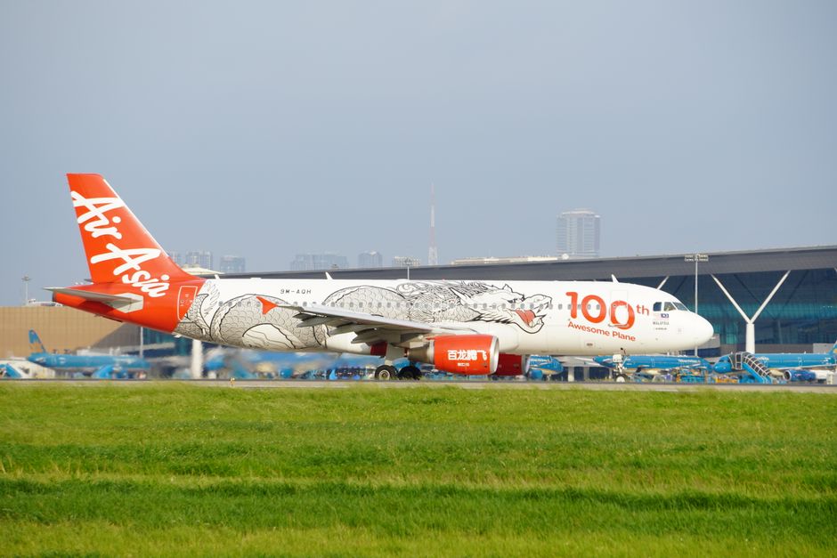 AirAsia aircraft parked at an airport gate in Cambodia