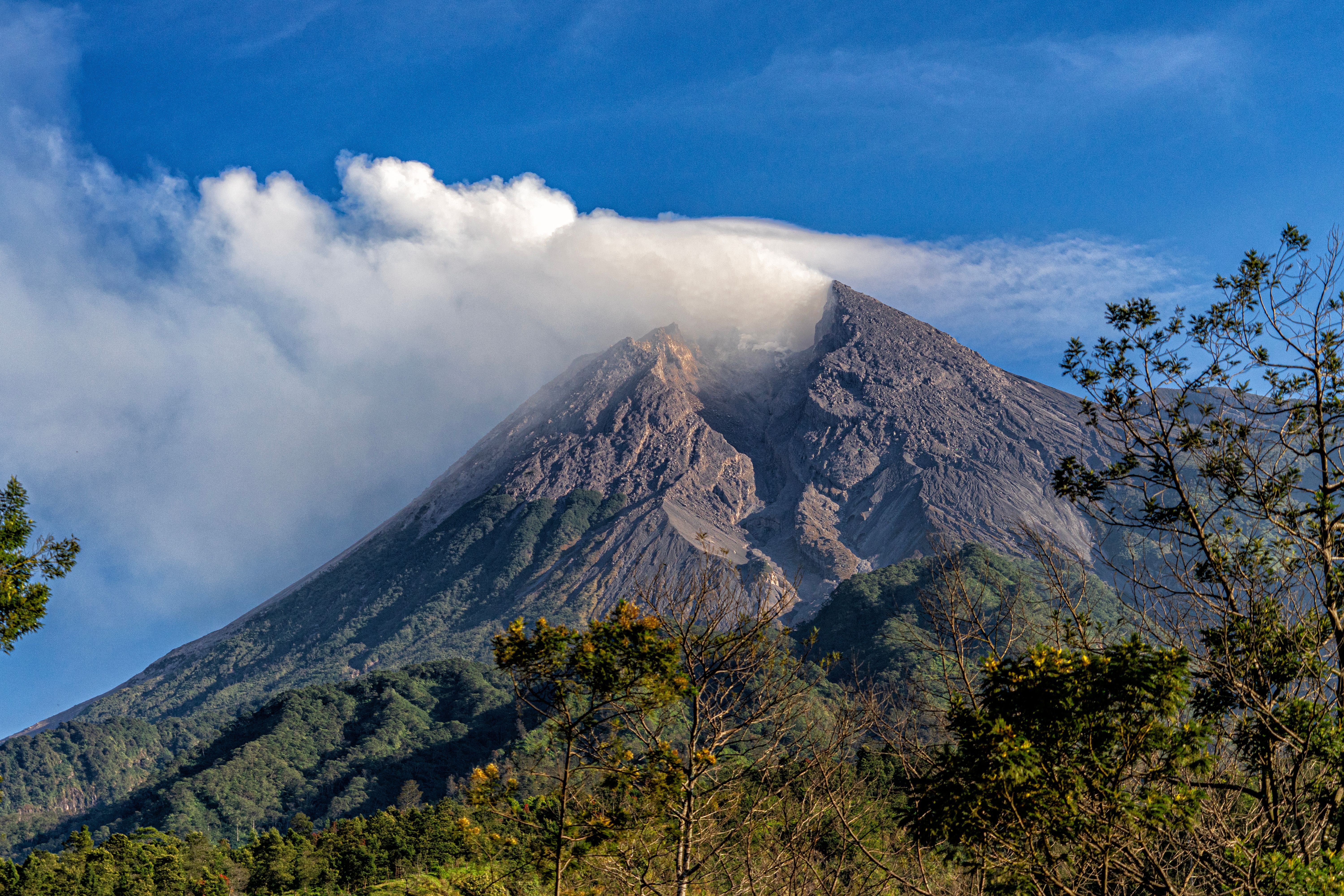 Captivating image of Mount Merapi releasing smoke in Central Java, Indonesia.