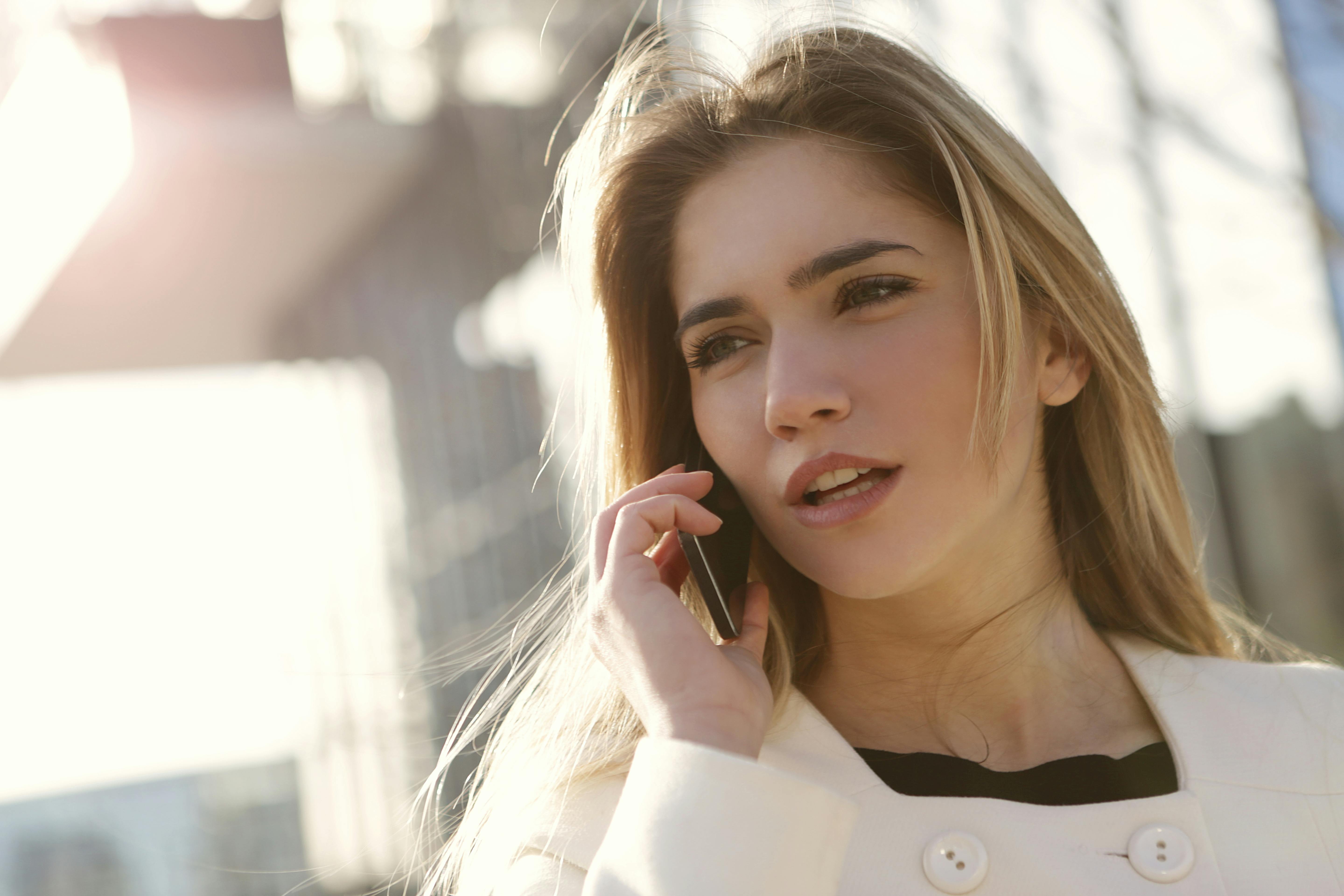 Closeup Portrait Of A Young Beautiful Woman. Wake Up In The Morning And  Read The News Online. Chat On The Phone. Chat With Friends Online Stock  Photo, Picture and Royalty Free Image.