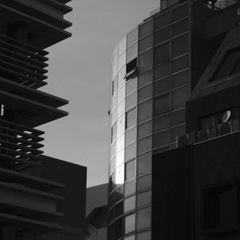 Stunning black and white photo capturing modern architectural designs at twilight.