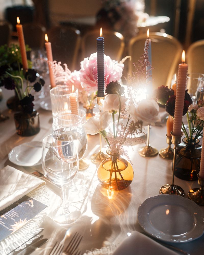 Romantic anniversary dinner table with candlelight and flowers