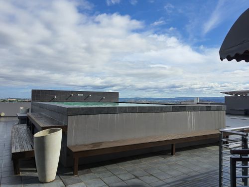 Free stock photo of building rooftops, rooftop pool Stock Photo