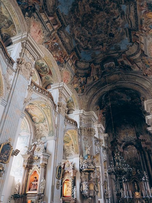 Free Intricate baroque cathedral interior showcasing stunning frescoes and architectural details. Stock Photo