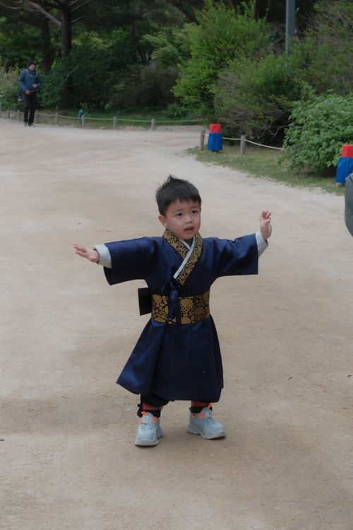 Free Young boy wearing a Hanbok in an outdoor setting in Seoul, South Korea. Stock Photo