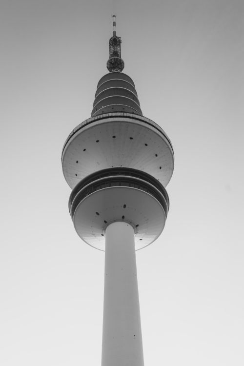 Free Artistic black and white perspective of a futuristic tower, emphasizing symmetry. Stock Photo