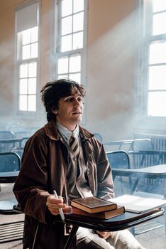 Solitary student with cigarette in a smoky sunlit Buenos Aires classroom, deep in thought.