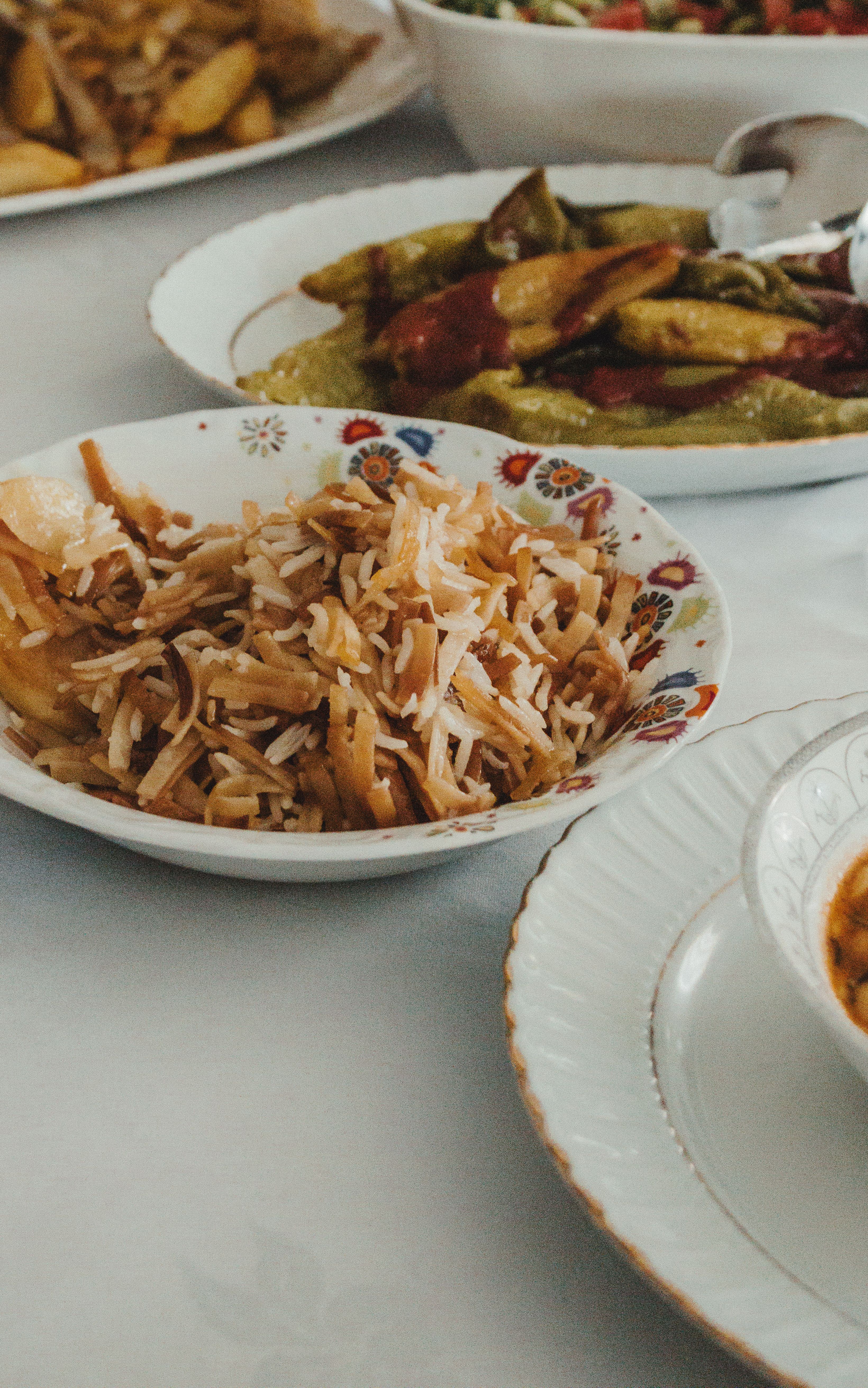 Close-up of a traditional Middle Eastern basmati rice dish served on a decorative plate.