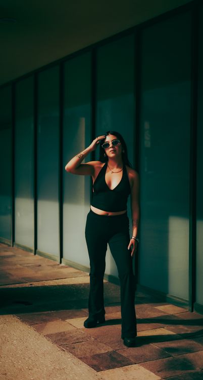Stylish Urban Woman Posing Outdoors · Free Stock Photo