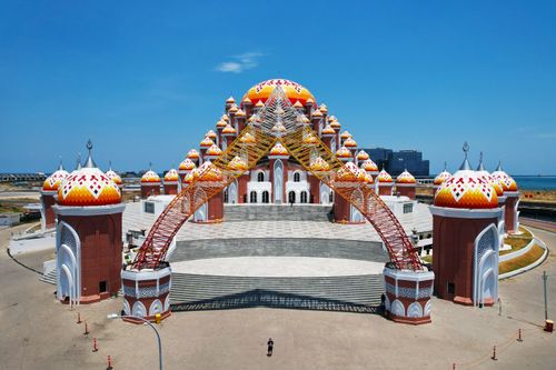 Free Aerial view of the vibrant 99 Dome Mosque in Makassar, South Sulawesi, Indonesia. Stock Photo