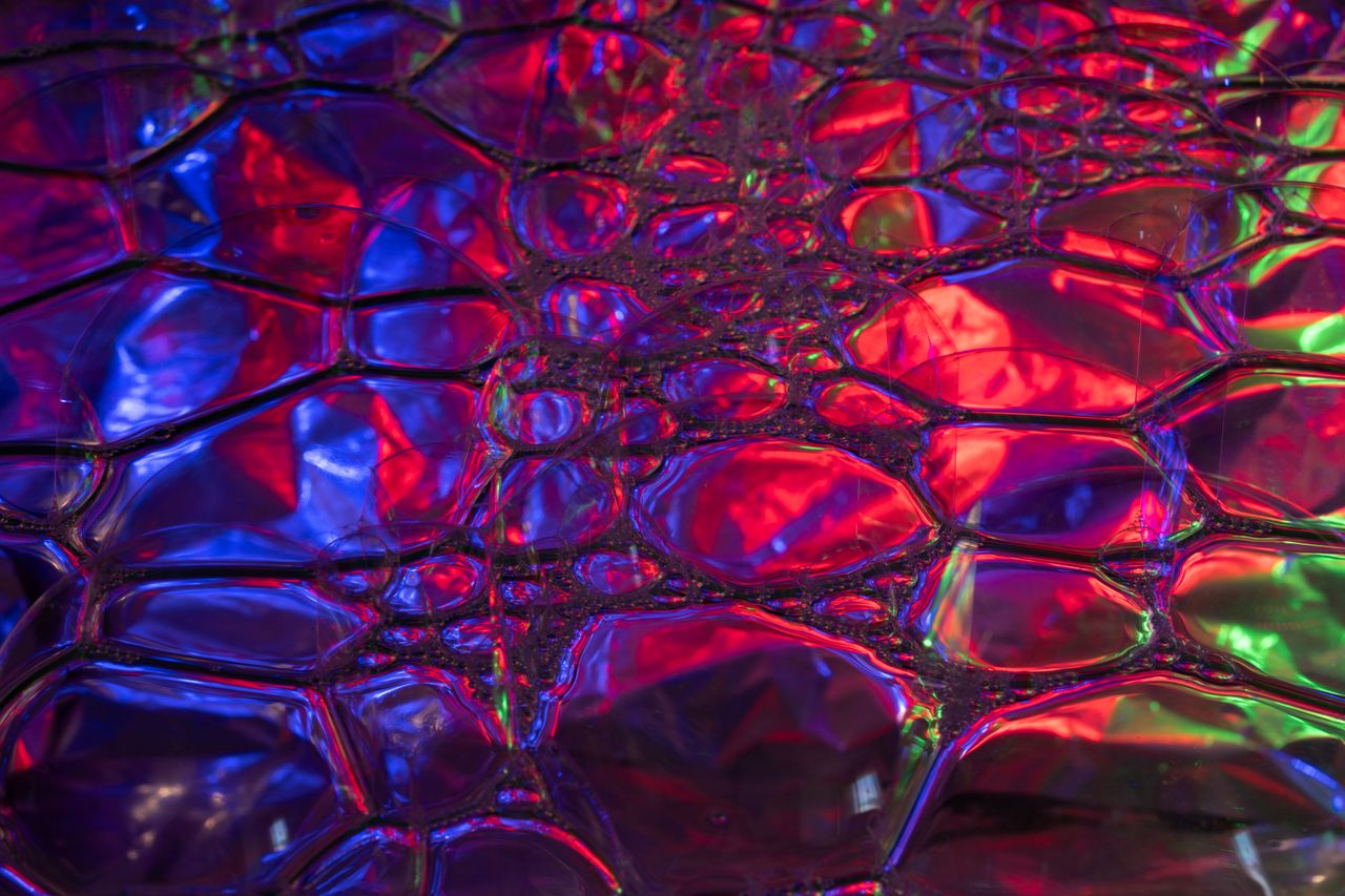 colorful abstract pattern with vibrant neon hues and bubble textures p