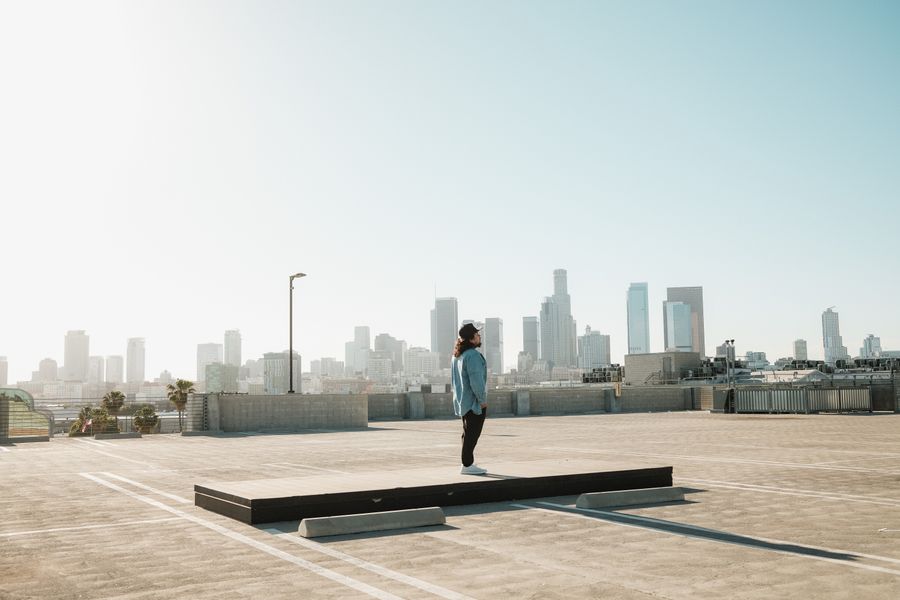Los Angeles downtown skyline viewed from a rooftop terrace in daylight
