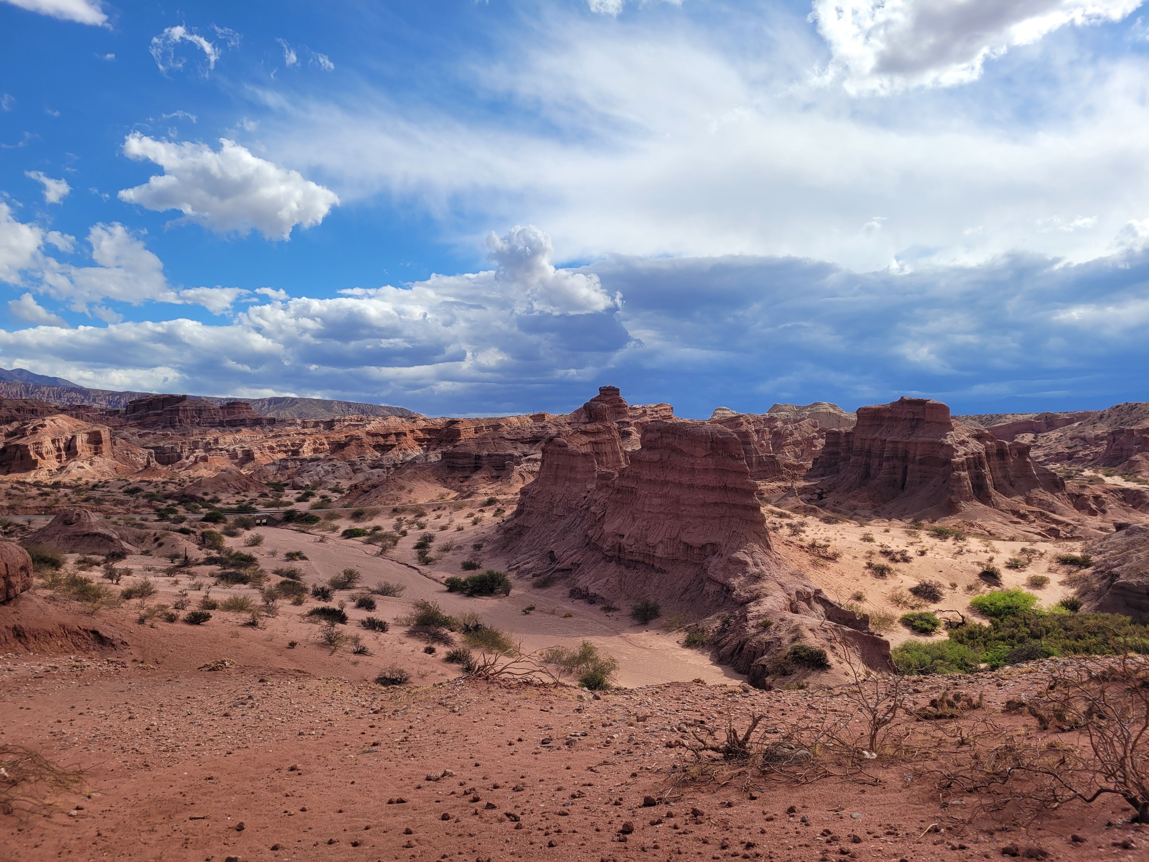 Captivating red rock formations under a dramatic sky in Salta, Argentina.