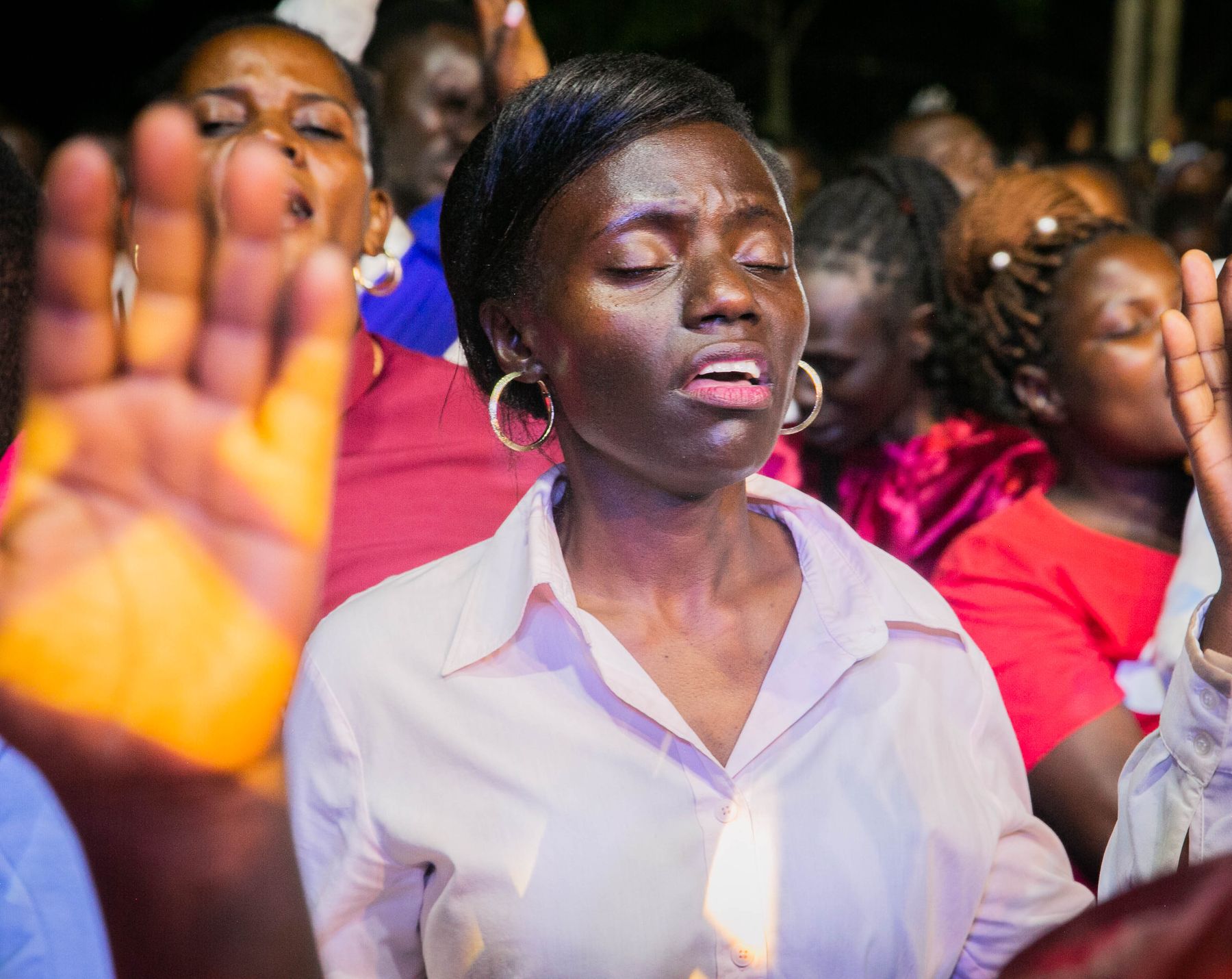Woman singing during worship