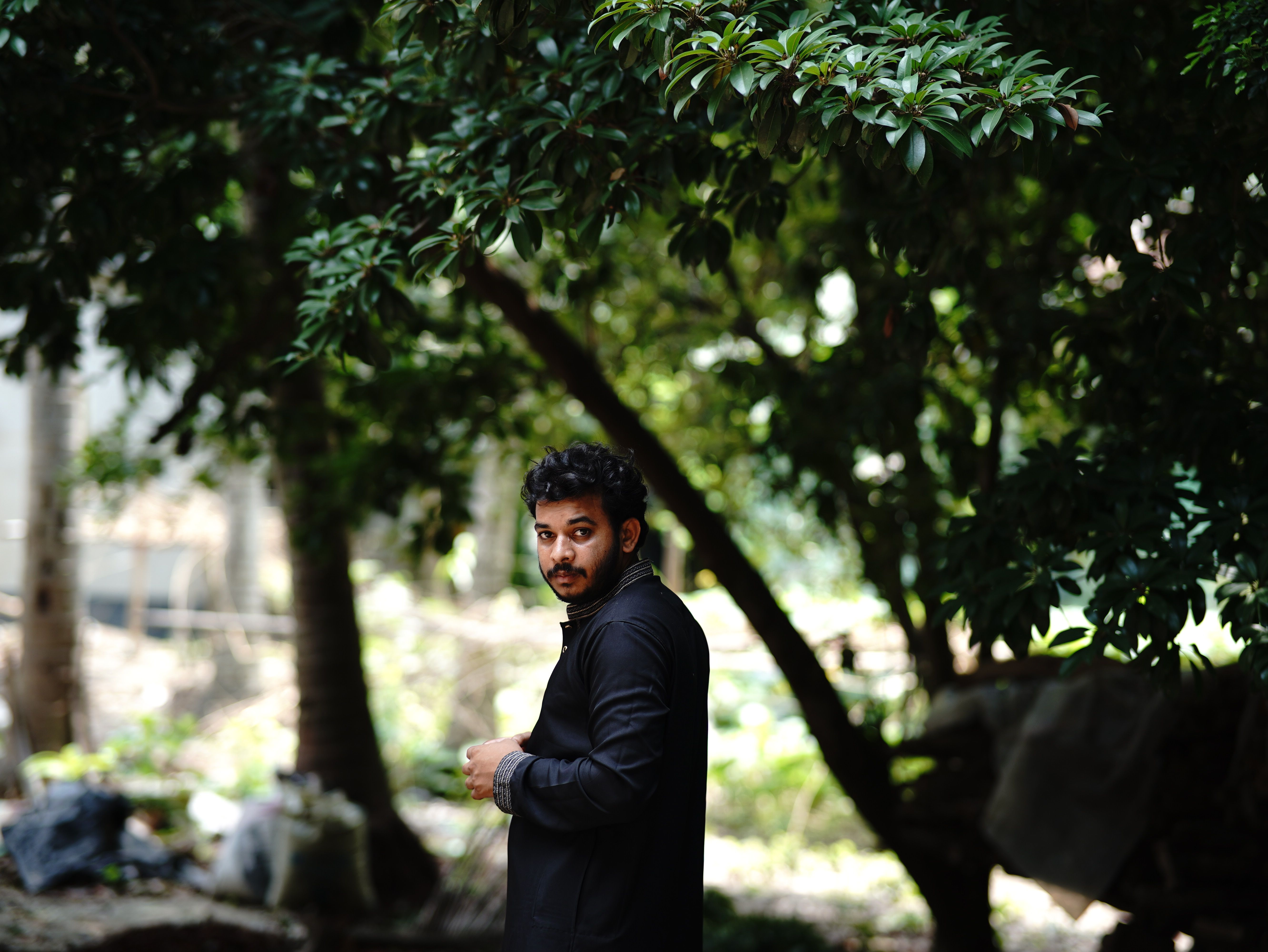 Portrait of a Man Outdoors in Dhaka, Bangladesh