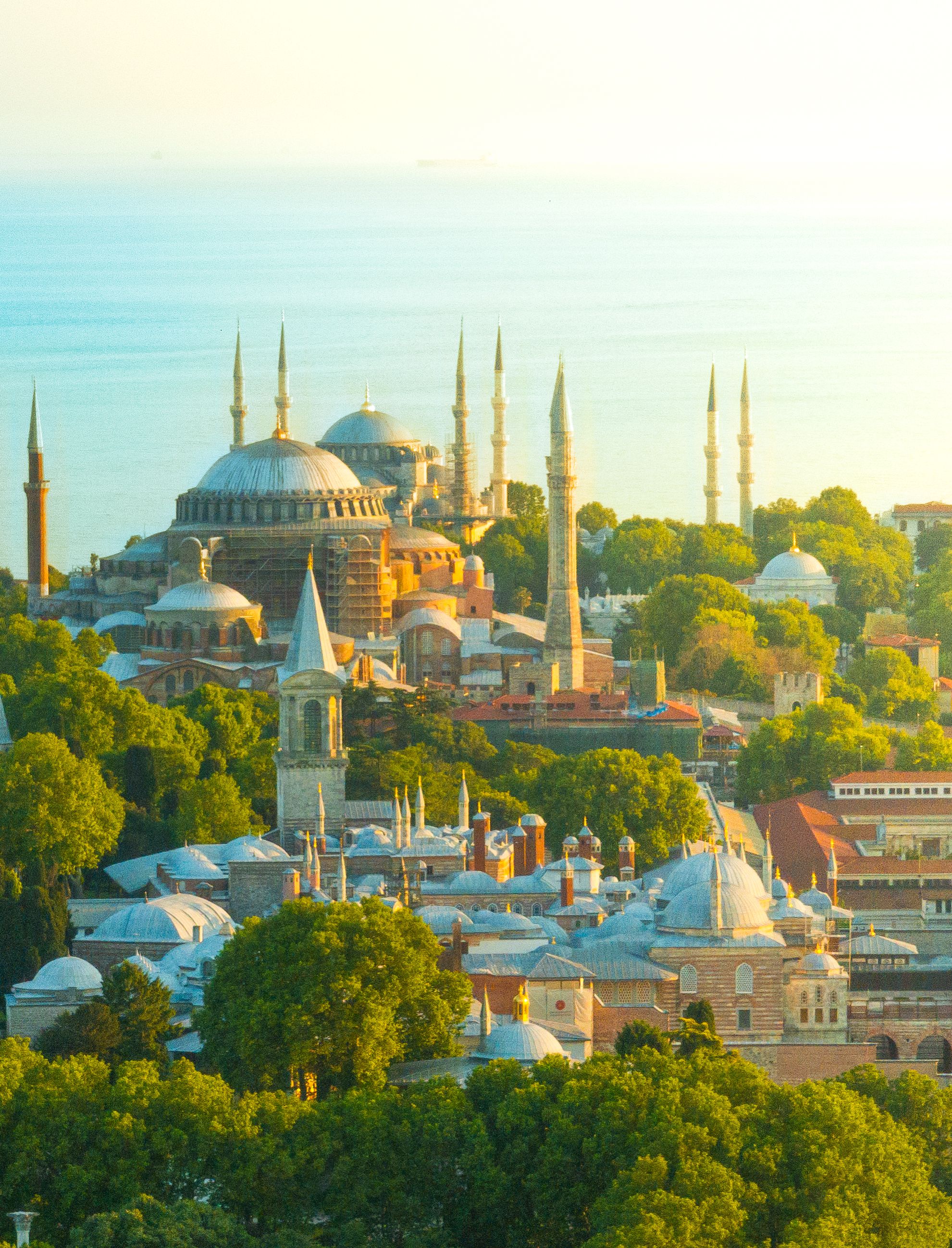 Captivating aerial view of historic Hagia Sophia in Istanbul, Turkiye under clear skies.