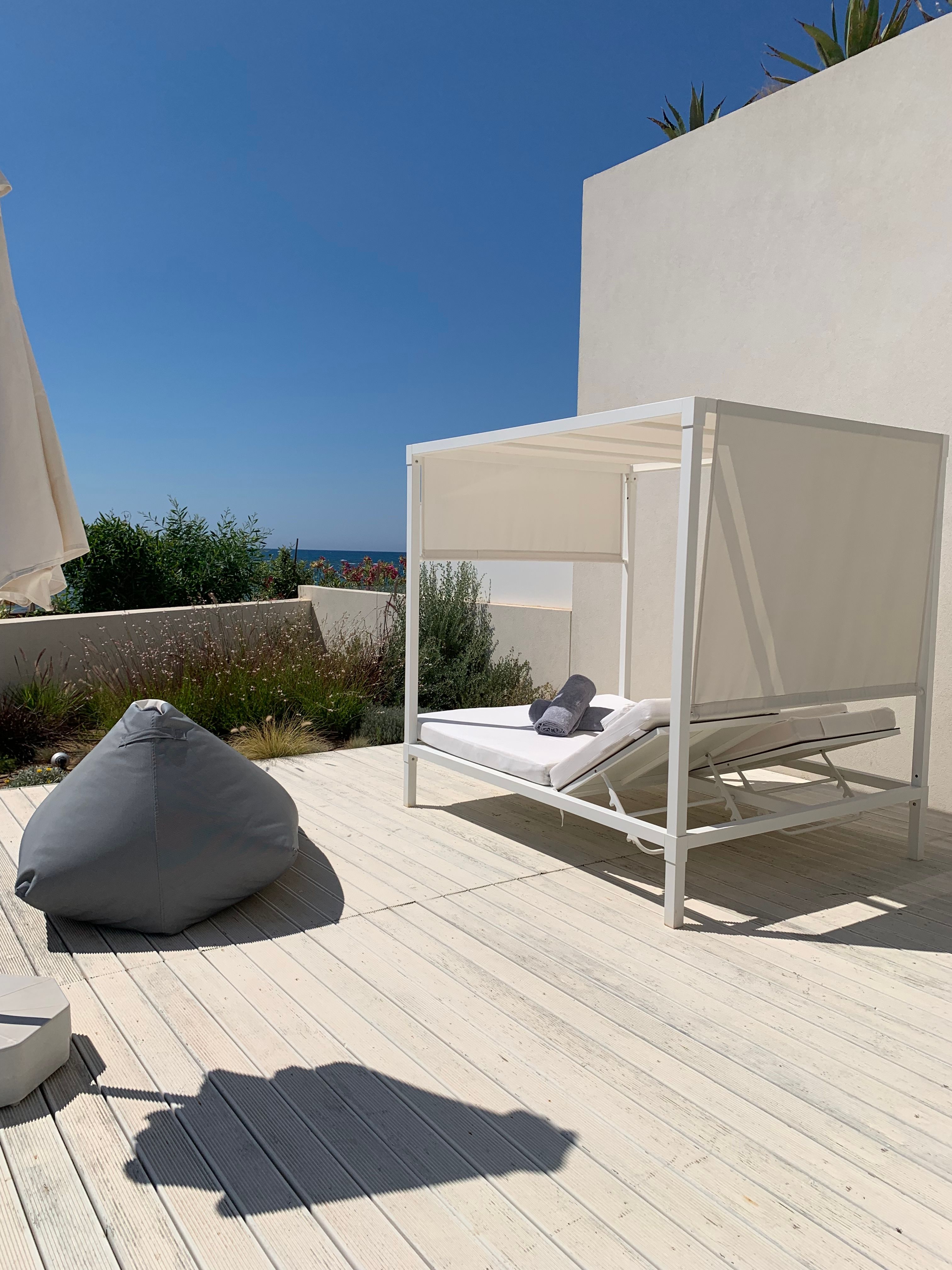 Artist's impression: landscaped coastal garden cabana overlooking the sea.