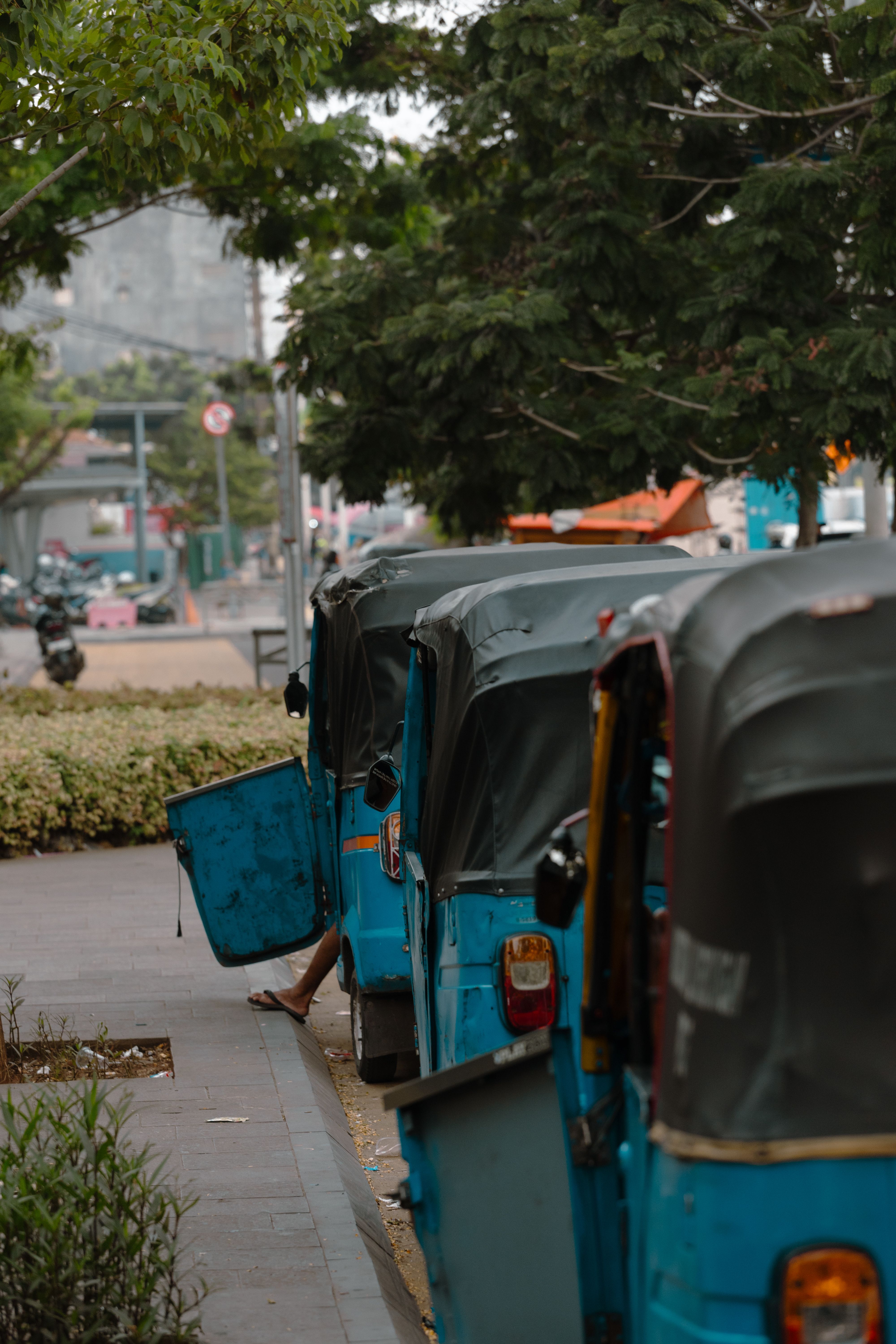 Blue Bajaj Rickshaws Parked on Jakarta Street · Free Stock Photo