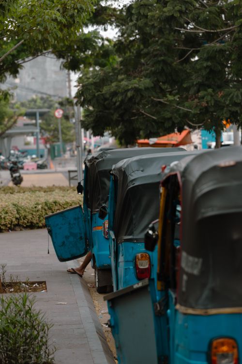 Blue Rickshaw Photo Blue Bajaj Rickshaws Parked on Jakarta Street · Free Stock Photo