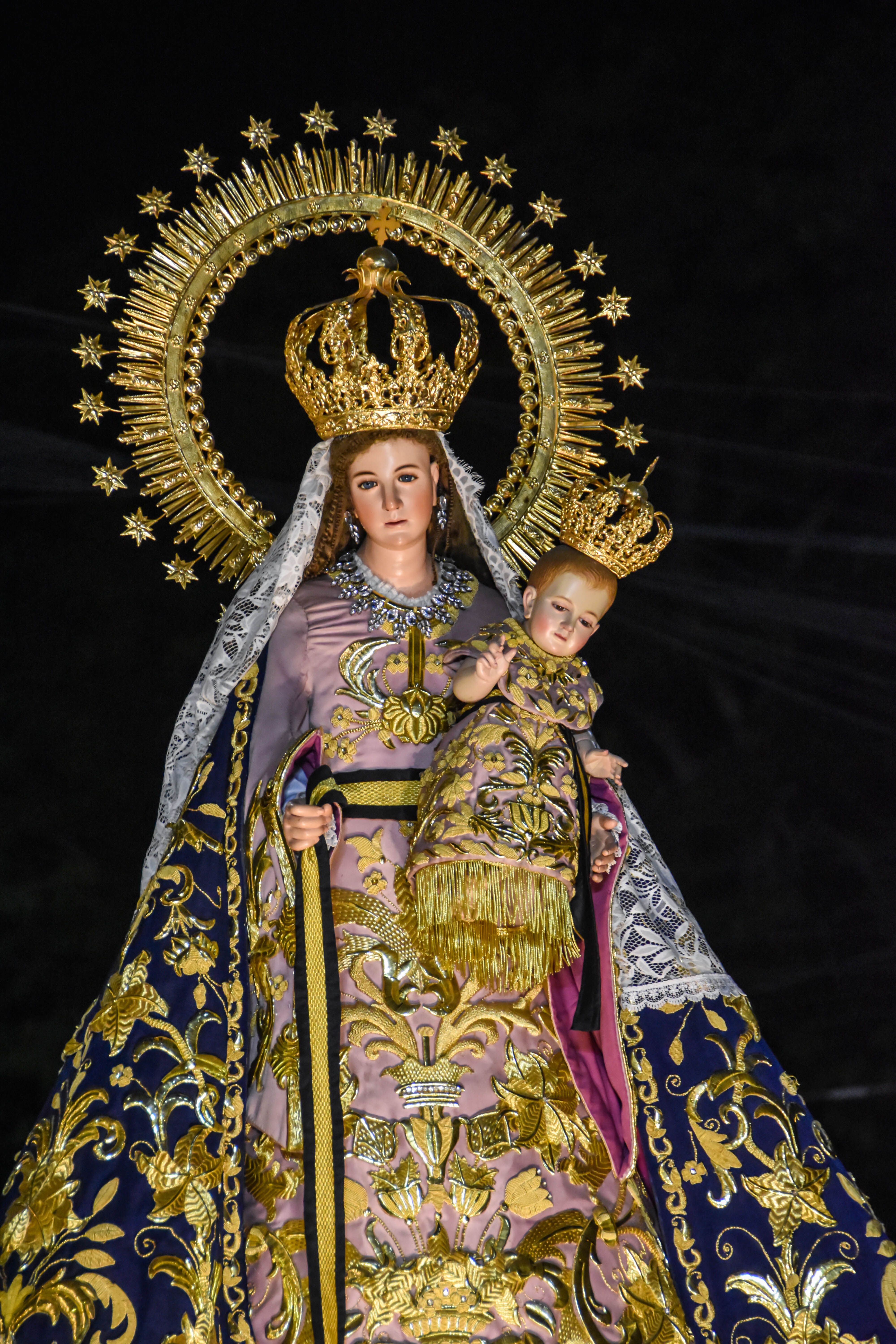 Detailed statue of Madonna and Child with gold embellishments, Guiguinto, Philippines.
