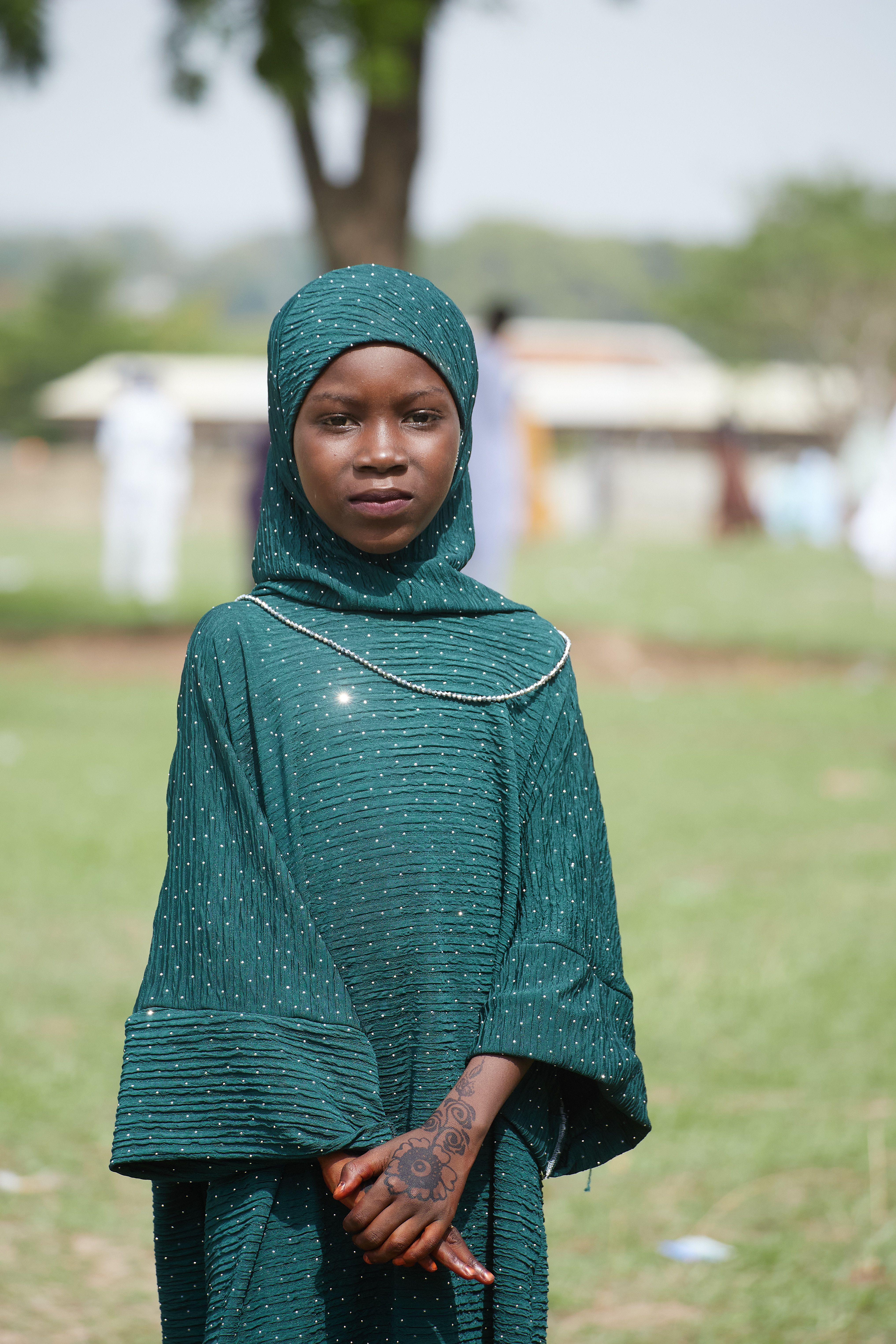 Portrait of a Young Girl in Traditional Dress Outdoors · Free Stock Photo