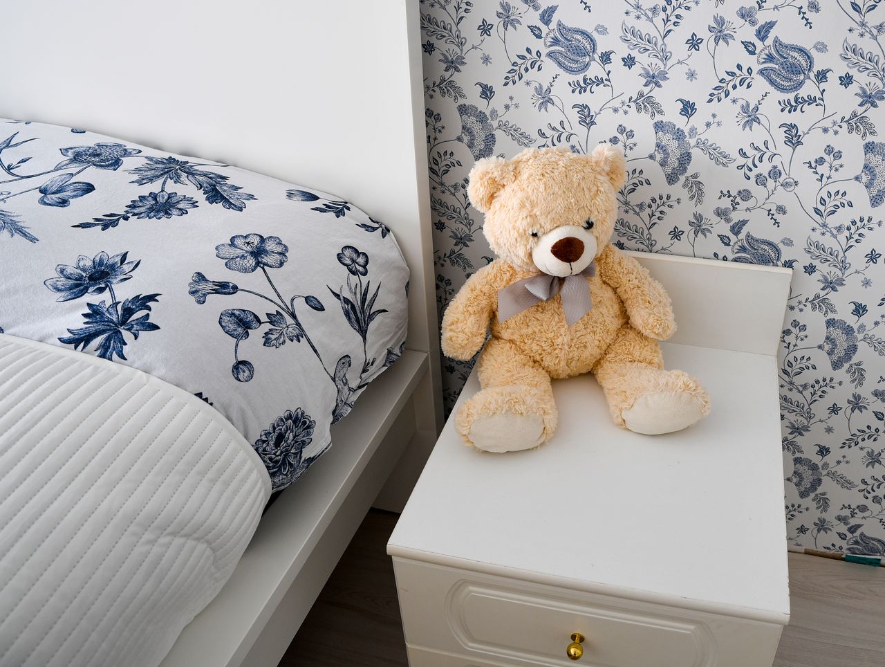 a cozy children s room in finland featuring floral bedding and a cute