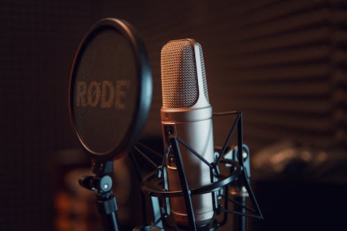 Free Silver Dynamic Microphone on Black Microphone Stand Stock Photo