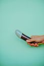 Person Holding a Eggplant