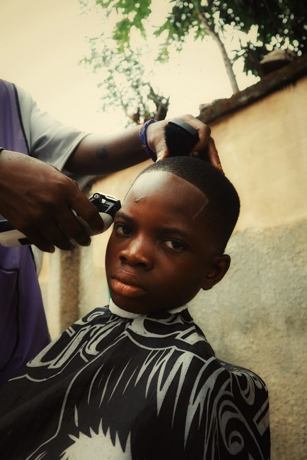 Young boy getting a haircut