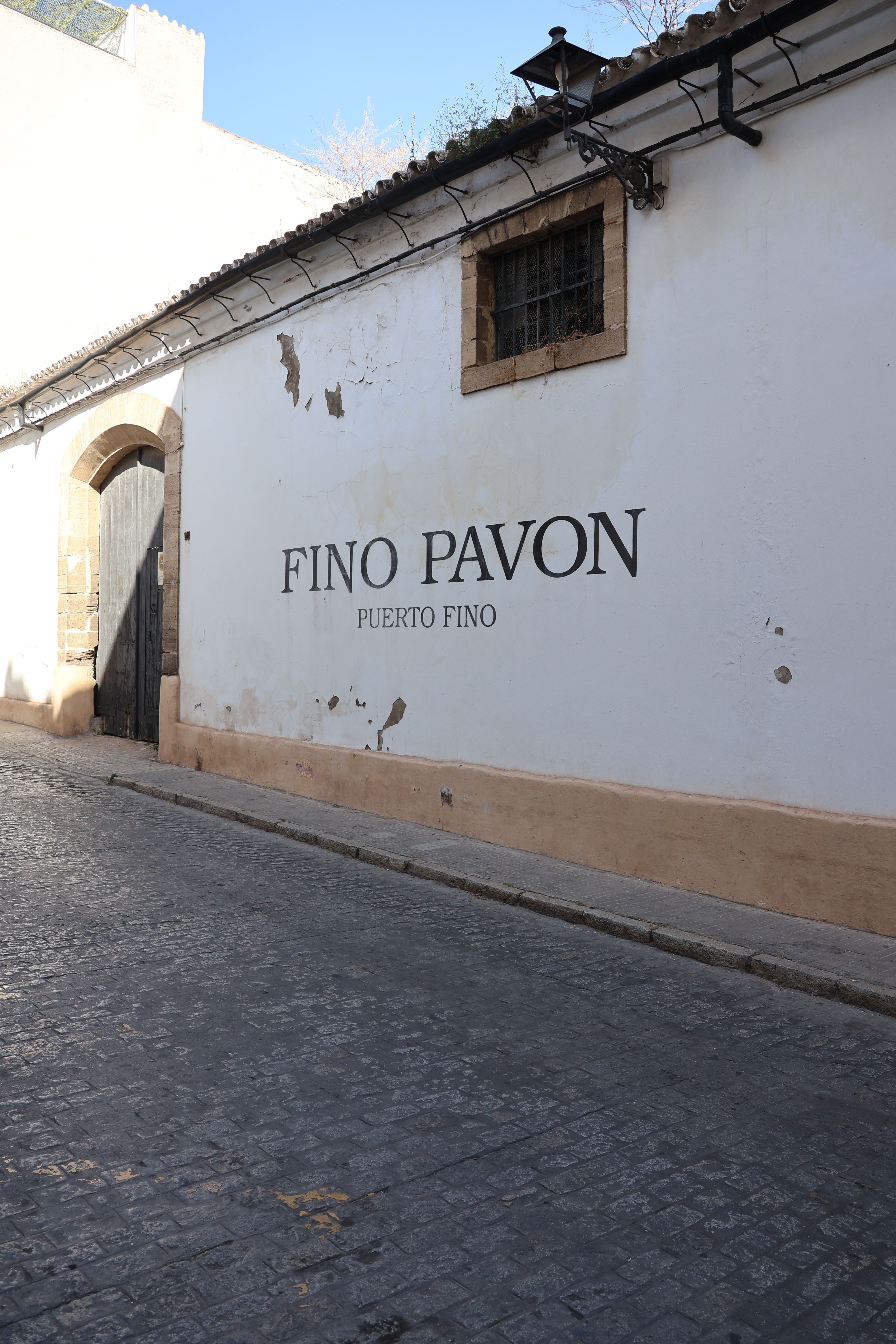 Elegant street view of Fino Pavon winery in El Puerto de Santa María.