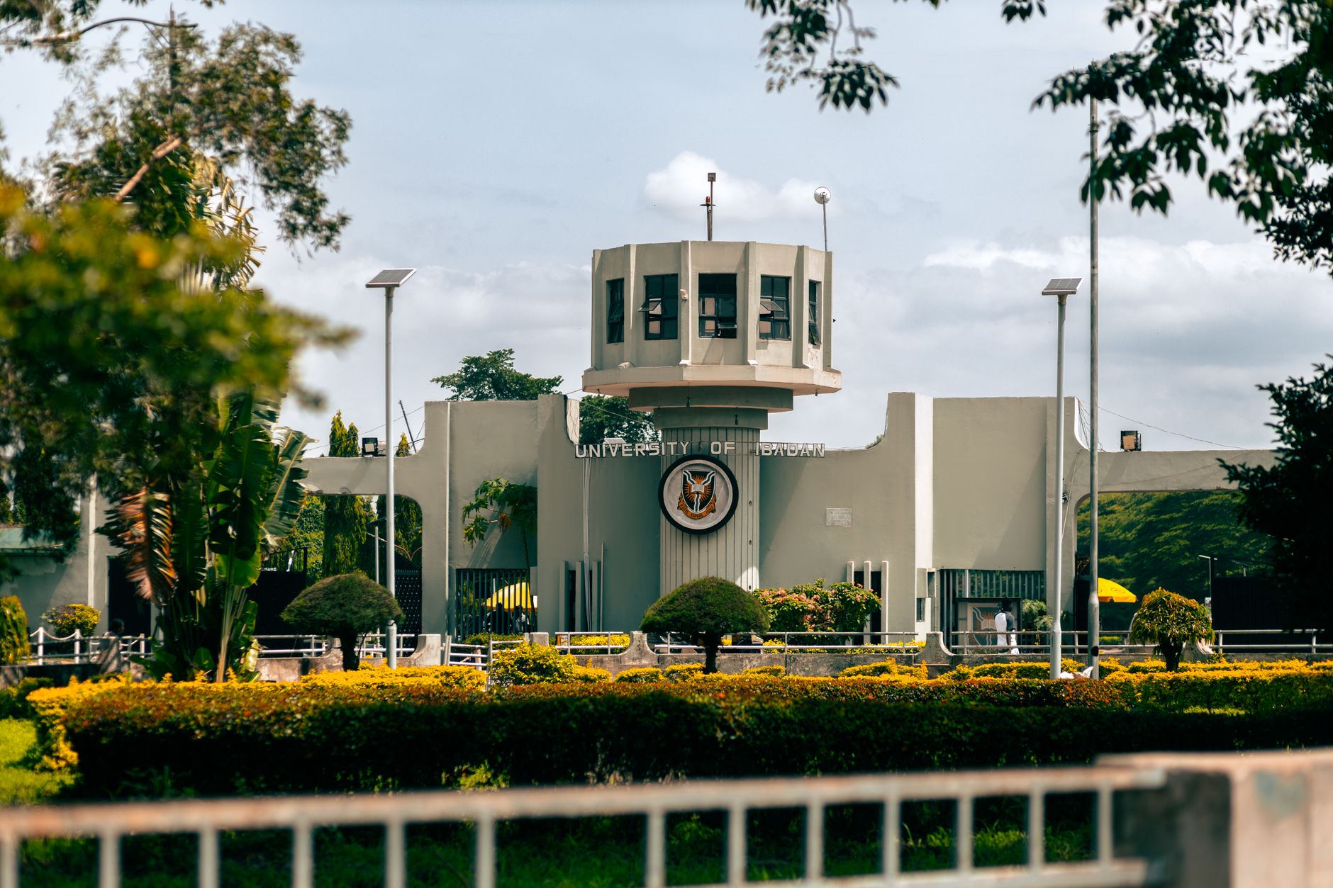 Main gate of the University of Ibadan, Nigeria captured on a sunny day.