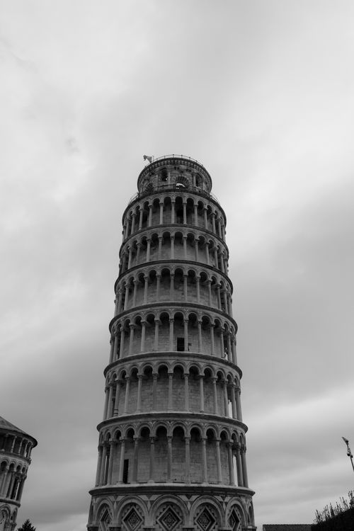 Free Dramatic black and white shot of the Leaning Tower of Pisa, Italy. Stock Photo