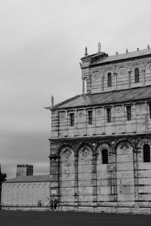 Free Monochrome photo of Pisa Cathedral highlighting rich architectural details. Stock Photo