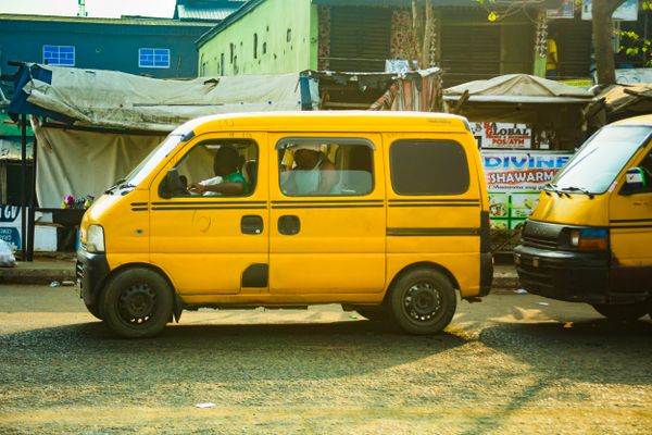 Yellow danfo on a busy Lagos street