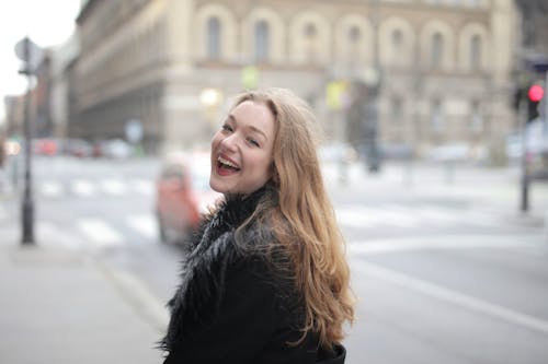 Joyful Woman Wearing Black Parka Jacket