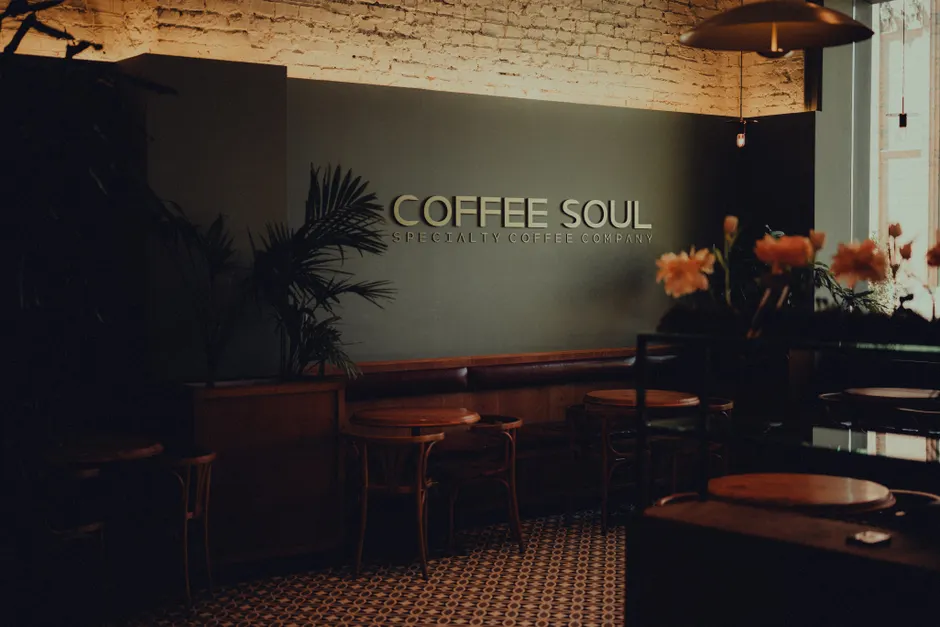 Custom website showcase for a specialty coffee shop — warm, inviting café interior