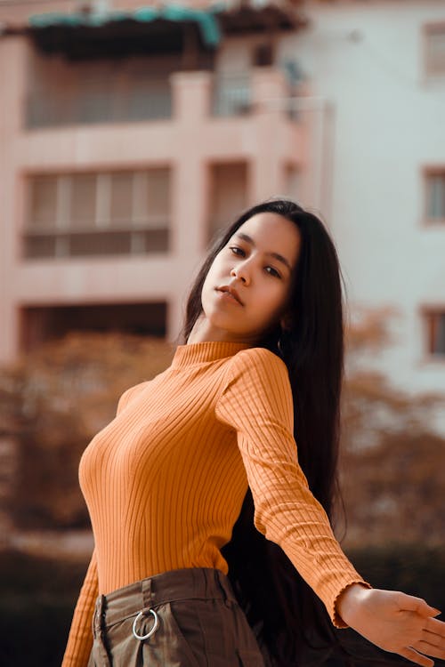 Woman in Orange Sweater