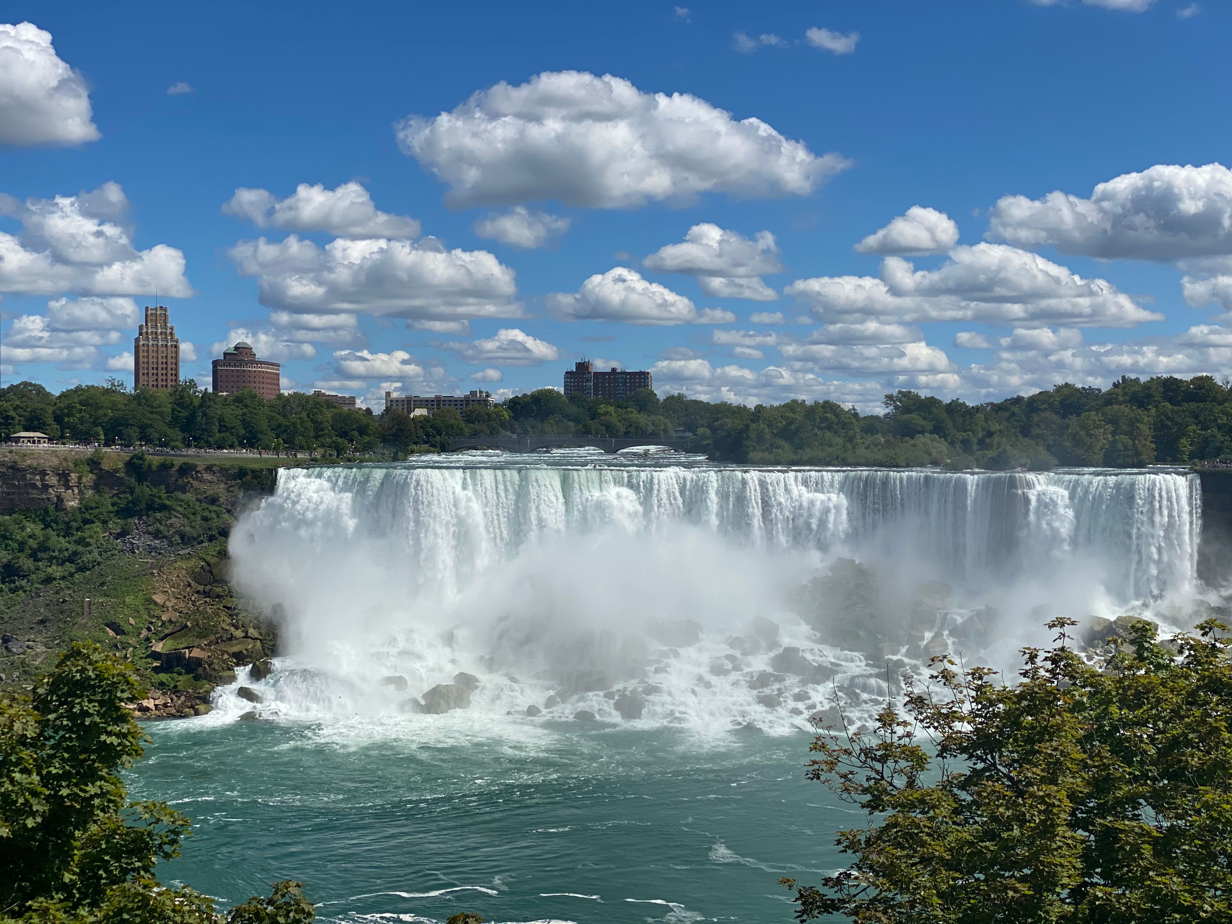 Niagara Falls: American Falls at Niagara Falls beneath a blue sky