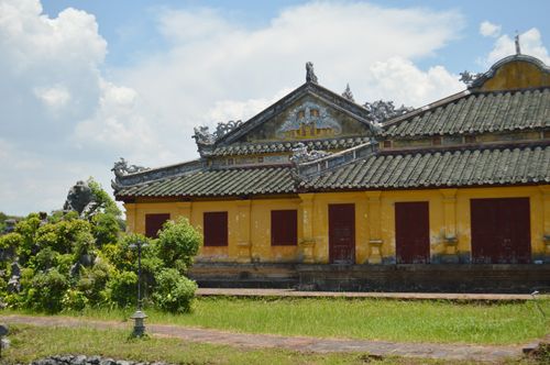 Free Beautiful Vietnamese temple with traditional architecture against a bright sky. Stock Photo