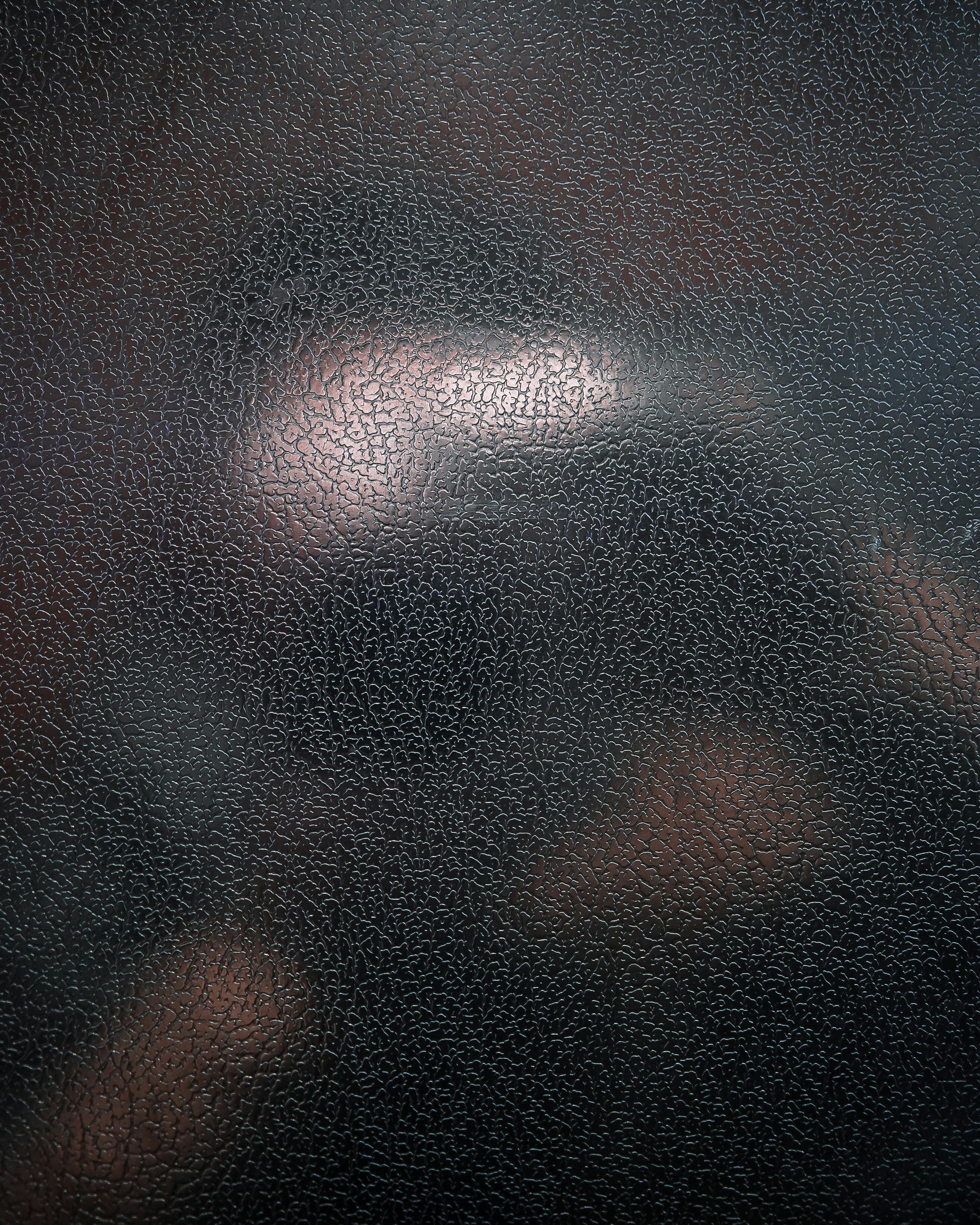 black and brown leather surface