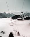 Cable Car  Near Snow Covered Mountain