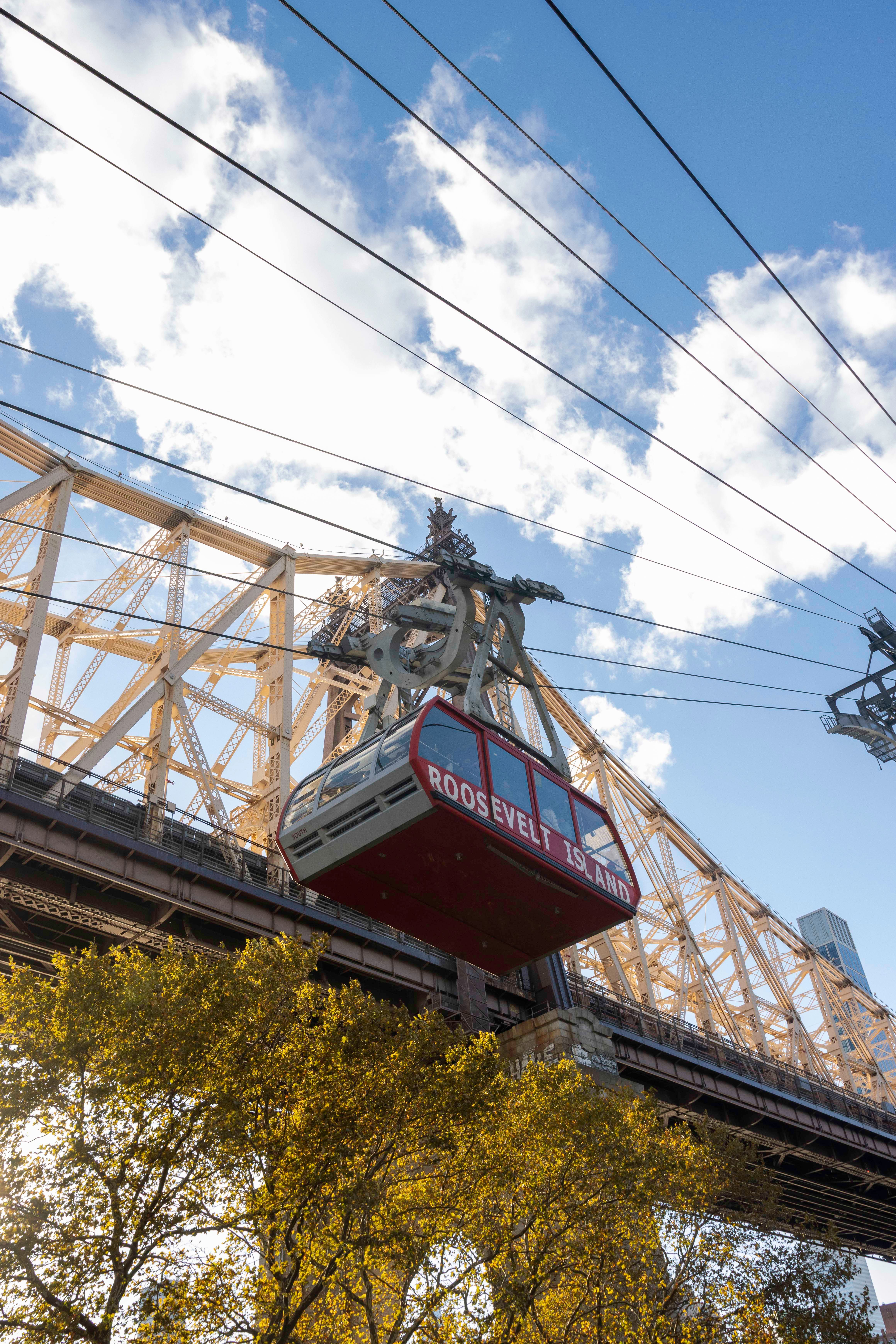Ropeway with observation cabin near cable bridge · Free Stock Photo