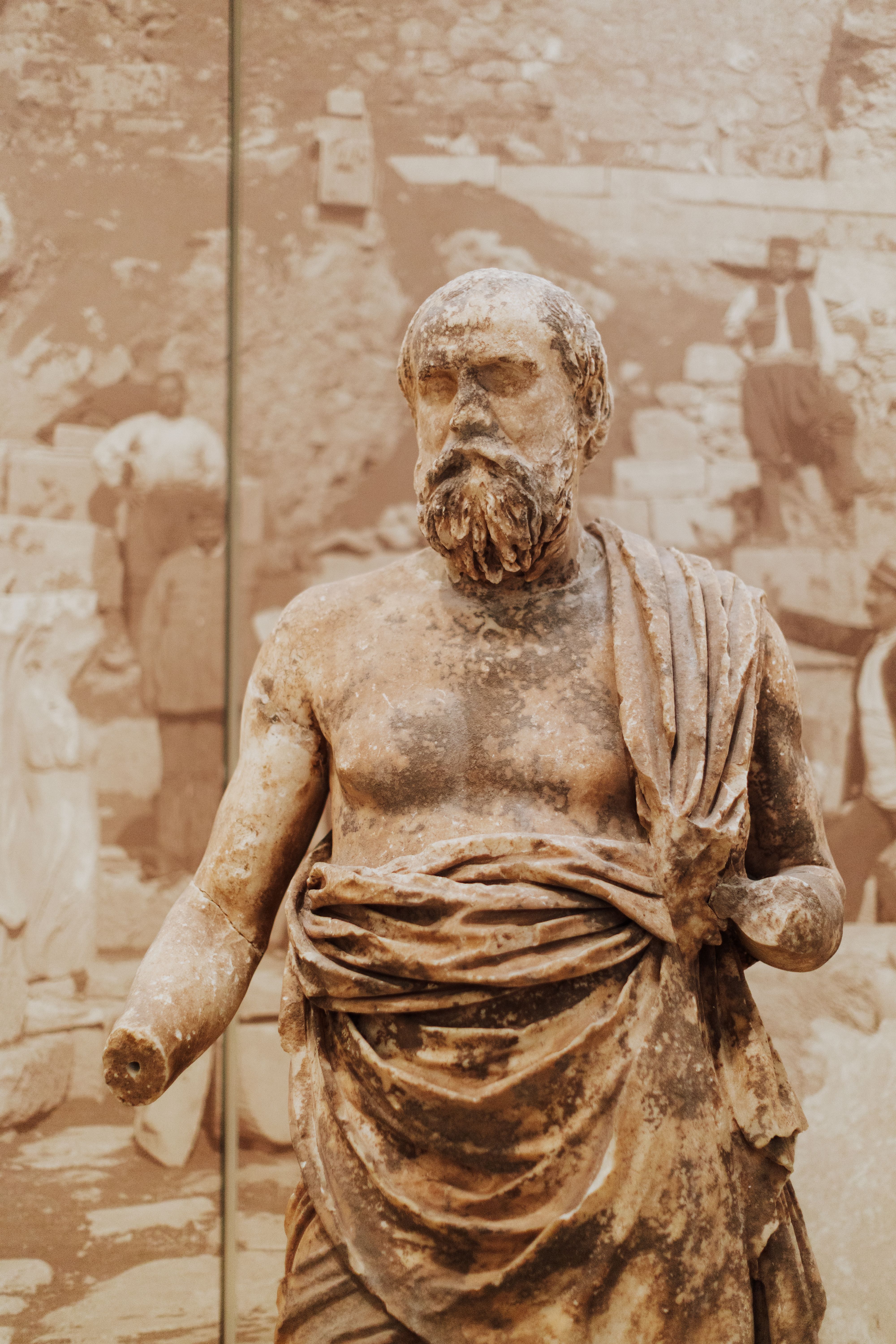 Close-up of an ancient Greek statue in the Delphi Archaeological Museum.
